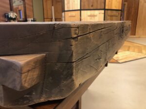 Adze mantel with notched ends